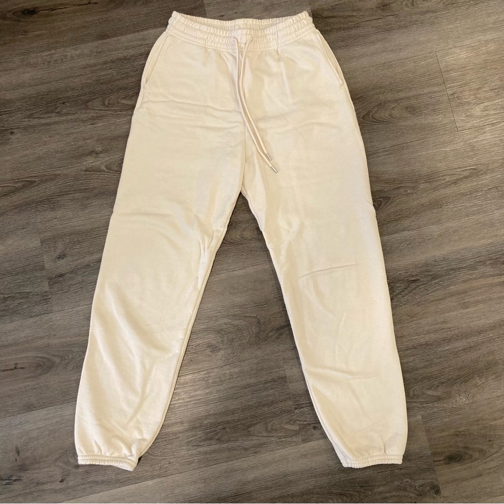 Cream Uniqlo joggers